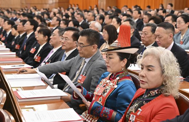 (260312) -- BEIJING, March 12, 2026 (Xinhua) -- The closing meeting of the fourth session of the 14th National People's Congress (NPC) is held at the Great Hall of the People in Beijing, capital of China, March 12, 2026. (Xinhua/Li Xin)