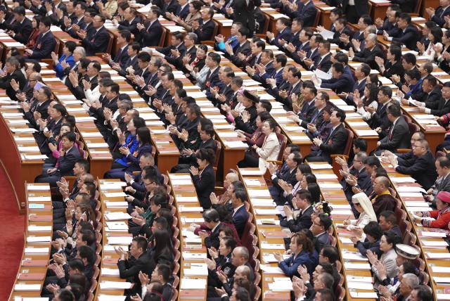 (260312) -- BEIJING, March 12, 2026 (Xinhua) -- The closing meeting of the fourth session of the 14th National People's Congress (NPC) is held at the Great Hall of the People in Beijing, capital of China, March 12, 2026. (Xinhua/Fu Tian)