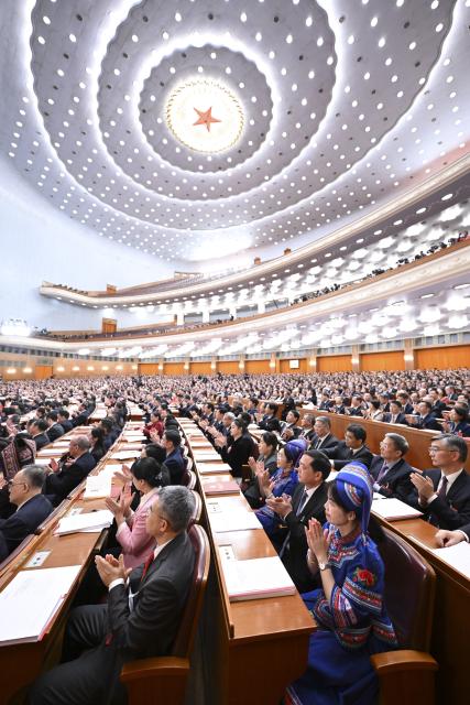 (260312) -- BEIJING, March 12, 2026 (Xinhua) -- The closing meeting of the fourth session of the 14th National People's Congress (NPC) is held at the Great Hall of the People in Beijing, capital of China, March 12, 2026. (Xinhua/Li Xiang)