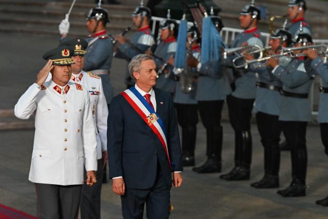 (260312) -- SANTIAGO, March 12, 2026 (Xinhua) -- Chile's President Jose Antonio Kast arrives at the La Moneda Presidential Palace in Santiago, Chile, March 11, 2026.
  Kast took office on Wednesday as Chile's new president for the 2026-2030 term, succeeding Gabriel Boric. (Photo by Jorge Villegas/Xinhua)
