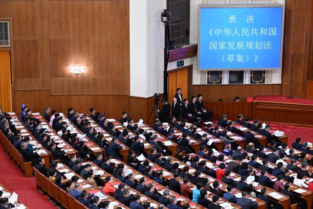 (260312) -- BEIJING, March 12, 2026 (Xinhua) -- The closing meeting of the fourth session of the 14th National People's Congress (NPC) is held at the Great Hall of the People in Beijing, capital of China, March 12, 2026. (Xinhua/Zhang Ling)