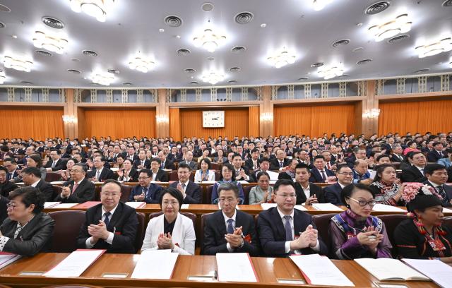(260312) -- BEIJING, March 12, 2026 (Xinhua) -- The closing meeting of the fourth session of the 14th National People's Congress (NPC) is held at the Great Hall of the People in Beijing, capital of China, March 12, 2026. (Xinhua/Li Xiang)