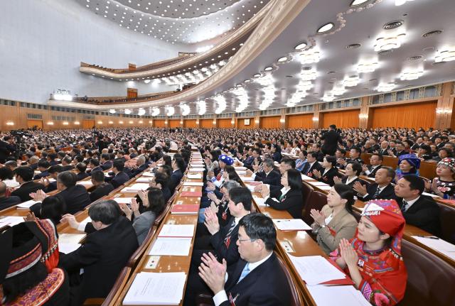 (260312) -- BEIJING, March 12, 2026 (Xinhua) -- The closing meeting of the fourth session of the 14th National People's Congress (NPC) is held at the Great Hall of the People in Beijing, capital of China, March 12, 2026. (Xinhua/Gao Jie)