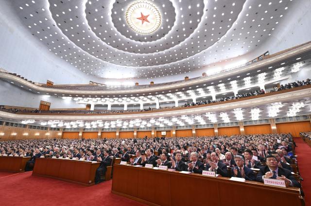 (260312) -- BEIJING, March 12, 2026 (Xinhua) -- The closing meeting of the fourth session of the 14th National People's Congress (NPC) is held at the Great Hall of the People in Beijing, capital of China, March 12, 2026. (Xinhua/Yan Yan)