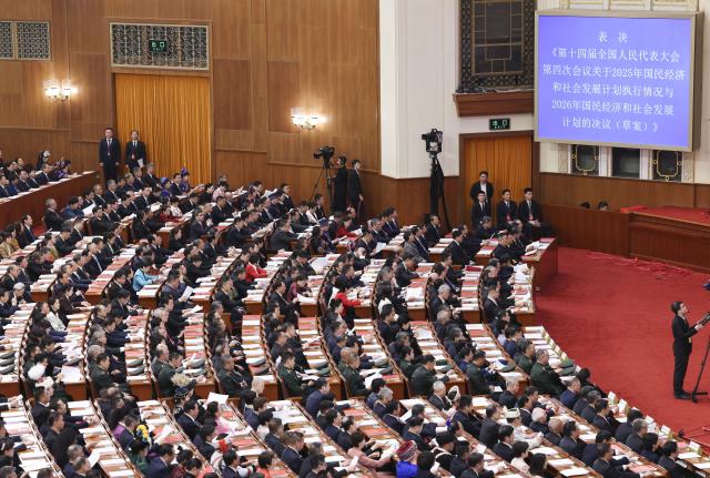 (260312) -- BEIJING, March 12, 2026 (Xinhua) -- The closing meeting of the fourth session of the 14th National People's Congress (NPC) is held at the Great Hall of the People in Beijing, capital of China, March 12, 2026. (Xinhua/Jin Liwang)