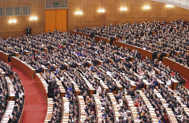 (260312) -- BEIJING, March 12, 2026 (Xinhua) -- The closing meeting of the fourth session of the 14th National People's Congress (NPC) is held at the Great Hall of the People in Beijing, capital of China, March 12, 2026. (Xinhua/Fu Tian)