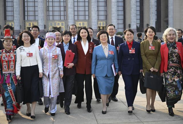 (260312) -- BEIJING, March 12, 2026 (Xinhua) -- Deputies to the 14th National People's Congress (NPC) leave the Great Hall of the People after the closing meeting of the fourth session of the 14th NPC in Beijing, capital of China, March 12, 2026. (Xinhua/Cai Xiangxin)