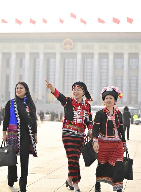 (260312) -- BEIJING, March 12, 2026 (Xinhua) -- Deputies to the 14th National People's Congress (NPC) leave the Great Hall of the People after the closing meeting of the fourth session of the 14th NPC in Beijing, capital of China, March 12, 2026. (Xinhua/Yue Yuewei)