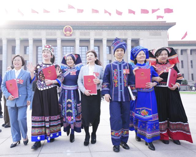 (260312) -- BEIJING, March 12, 2026 (Xinhua) -- Deputies to the 14th National People's Congress (NPC) leave the Great Hall of the People after the closing meeting of the fourth session of the 14th NPC in Beijing, capital of China, March 12, 2026. (Xinhua/Xing Guangli)