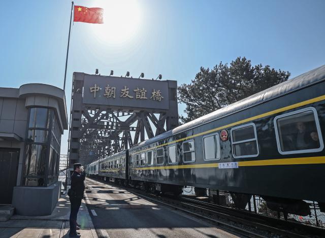(260312) -- DANDONG, March 12, 2026 (Xinhua) -- The train No. 95 from Dandong of China to Pyongyang of the Democratic People's Republic of Korea (DPRK) passes a border bridge in Dandong, northeast China's Liaoning Province, March 12, 2026. An international passenger train linking Dandong in northeast China's Liaoning Province with Pyongyang, capital of the Democratic People's Republic of Korea (DPRK), began service on Thursday.
   The passenger service will operate daily in both directions. (Xinhua/Pan Yulong)