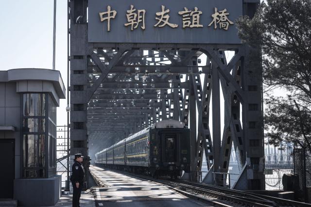 (260312) -- DANDONG, March 12, 2026 (Xinhua) -- The train No. 95 from Dandong of China to Pyongyang of the Democratic People's Republic of Korea (DPRK) passes a border bridge in Dandong, northeast China's Liaoning Province, March 12, 2026. An international passenger train linking Dandong in northeast China's Liaoning Province with Pyongyang, capital of the Democratic People's Republic of Korea (DPRK), began service on Thursday.
   The passenger service will operate daily in both directions. (Xinhua/Pan Yulong)