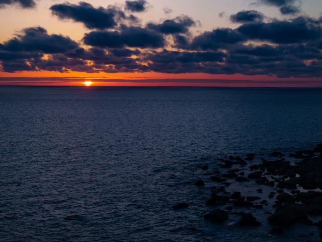 (260312) -- AKTAU, March 12, 2026 (Xinhua) -- An aerial drone photo taken on March 10, 2026 shows a view of the Caspian Sea at sunset in Aktau, Kazakhstan. (Xinhua/Li Renzi)