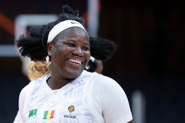 (260312) -- WUHAN, March 12, 2026 (Xinhua) -- Alima Dembele of Mali celebrates after winning the group A match between the Czech Republic and Mali at FIBA Women's World Cup Qualifying Tournaments in Wuhan, central China's Hubei Province, Feb. 12, 2026. (Xinhua/Wu Zhizun)