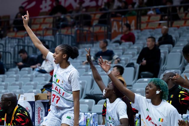 (260312) -- WUHAN, March 12, 2026 (Xinhua) -- Players of Mali celebrate during the group A match between the Czech Republic and Mali at FIBA Women's World Cup Qualifying Tournaments in Wuhan, central China's Hubei Province, Feb. 12, 2026. (Xinhua/Wu Zhizun)