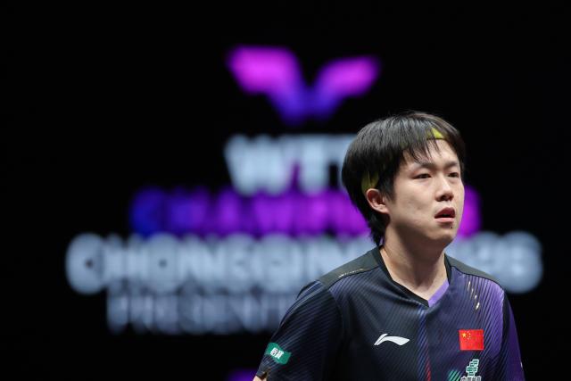 (260312) -- CHONGQING, March 12, 2026 (Xinhua) -- Wang Chuqin of China reacts during the men's singles round of 16 match against Patrick Franziska of Germany at the WTT Champions Chongqing 2026 in southwest China's Chongqing, March 12, 2026. (Xinhua/Huang Wei)