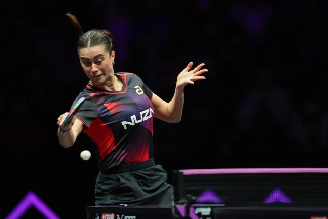 (260312) -- CHONGQING, March 12, 2026 (Xinhua) -- Bruna Takahashi of Brazil hits a return during the women's singles round of 16 match against Kuai Man of China at the WTT Champions Chongqing 2026 in southwest China's Chongqing, March 12, 2026. (Xinhua/Huang Wei)