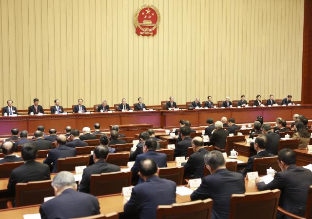 (260312) -- BEIJING, March 12, 2026 (Xinhua) -- Zhao Leji, executive chairman of the presidium of the fourth session of the 14th National People's Congress (NPC), presides over the fourth meeting of the presidium at the Great Hall of the People in Beijing, capital of China, March 12, 2026. (Xinhua/Ding Haitao)
