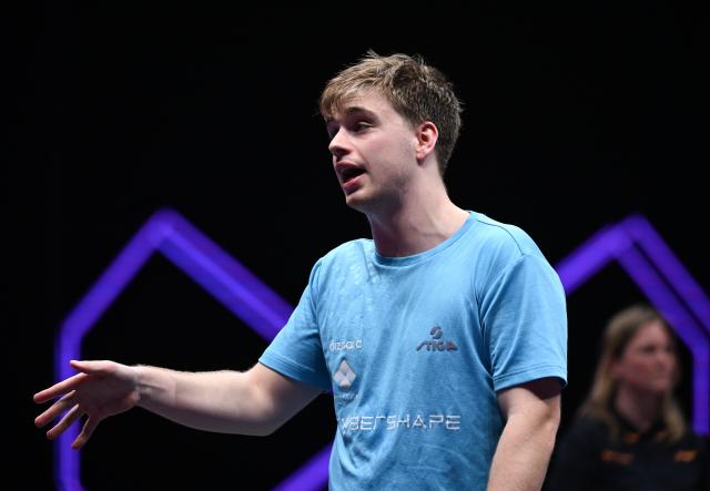 (260312) -- CHONGQING, March 12, 2026 (Xinhua) -- Truls Moregard reacts during the men's singles round of 16 match between Wen Ruibo of China and Truls Moregard of Sweden at the WTT Champions Chongqing 2026 in southwest China's Chongqing, March 12, 2026. (Xinhua/Chen Cheng)