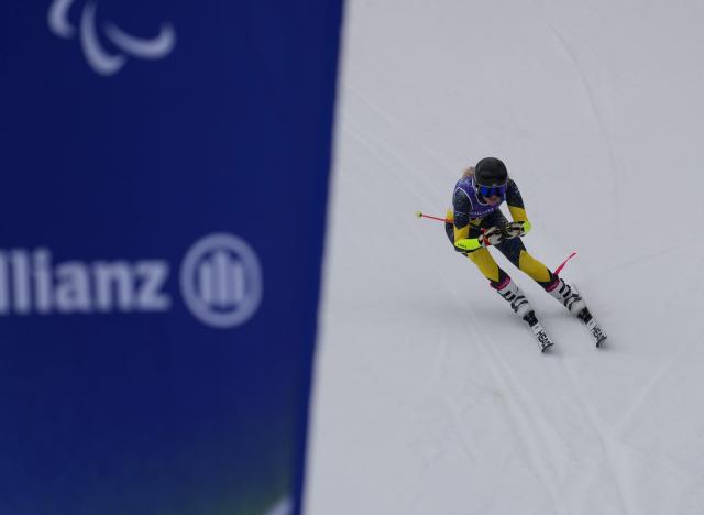 (260312) -- CORTINA D'AMPEZZO, March 12, 2026 (Xinhua) -- Ebba Aarsjoe of Sweden competes during women's giant slalom standing of the para alpine skiing event at the Milan-Cortina 2026 Paralympic Winter Games in Cortina D'ampezzo, Italy, March 12, 2026. (Xinhua/Mu Yu)