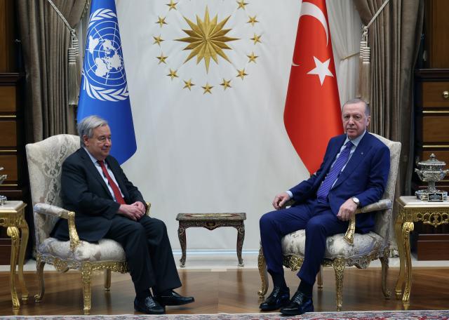 (260312) -- ANKARA, March 12, 2026 (Xinhua) -- Turkish President Recep Tayyip Erdogan (R) meets with visiting UN Secretary-General Antonio Guterres at the presidential complex in Ankara, Türkiye, March 12, 2026. (Mustafa Kaya/Handout via Xinhua)