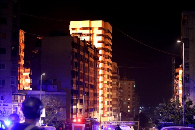 (260312) -- BEIRUT, March 12, 2026 (Xinhua) -- The photo taken on March 12, 2026 shows buildings damaged by an Israeli airstrike in the Zkak al-Blat area of Beirut, Lebanon. The Israeli military announced on Thursday afternoon that it launched a new series of airstrikes in Beirut targeting Hezbollah targets. (Photo by Bilal Jawich / Xinhua)