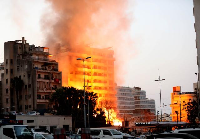 (260312) -- BEIRUT, March 12, 2026 (Xinhua) -- The photo taken on March 12, 2026 shows buildings damaged by an Israeli airstrike in the Bachoura area of Beirut, Lebanon. The Israeli military announced on Thursday afternoon that it launched a new series of airstrikes in Beirut targeting Hezbollah targets. (Photo by Bilal Jawich / Xinhua)