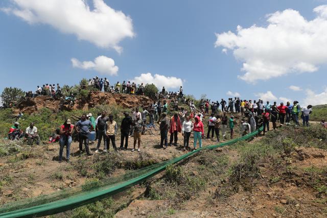 (260313) -- NAIVASHA, March 13, 2026 (Xinhua) -- People watch the race along the track during the WRC Safari Rally Kenya 2026 in Naivasha, Nakuru county, Kenya, March 12, 2026. (Photo by Henry Naminde/Xinhua)