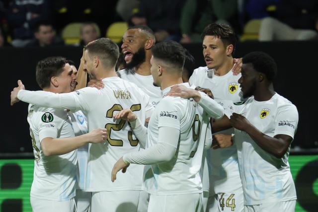 (260313) -- CELJE, March 13, 2026 (Xinhua) -- Players of AEK Athens celebrate scoring during the UEFA Conference League match between NK Celje and AEK Athens in Celje, Slovenia, on March 12, 2026. (Photo by zeljko stevanic/Xinhua)