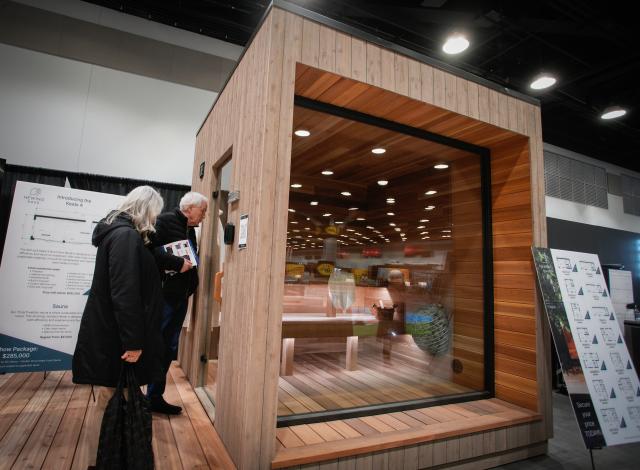 (260313) -- VANCOUVER, March 13, 2026 (Xinhua) -- Visitors view an outdoor sauna unit during the 2026 BC Home and Garden Show in Vancouver, British Columbia, Canada, on March 12, 2026. The four-day event runs through March 15. (Photo by Liang Sen/Xinhua)