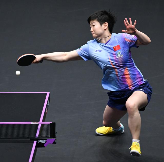 (260313) -- CHONGQING, March 13, 2026 (Xinhua) -- Sun Yingsha competes during the women's singles round of 16 match between Sun Yingsha of China and Adriana Diaz of Puerto Rico at the WTT Champions Chongqing 2026 in southwest China's Chongqing, March 13, 2026. (Xinhua/Chen Cheng)