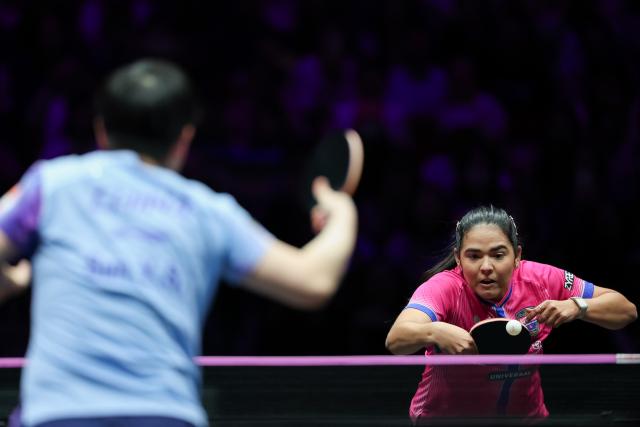 (260313) -- CHONGQING, March 13, 2026 (Xinhua) -- Adriana Diaz competes during the women's singles round of 16 match between Sun Yingsha of China and Adriana Diaz of Puerto Rico at the WTT Champions Chongqing 2026 in southwest China's Chongqing, March 13, 2026. (Xinhua/Huang Wei)