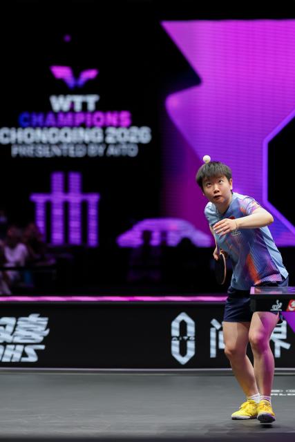 (260313) -- CHONGQING, March 13, 2026 (Xinhua) -- Sun Yingsha competes during the women's singles round of 16 match between Sun Yingsha of China and Adriana Diaz of Puerto Rico at the WTT Champions Chongqing 2026 in southwest China's Chongqing, March 13, 2026. (Xinhua/Huang Wei)