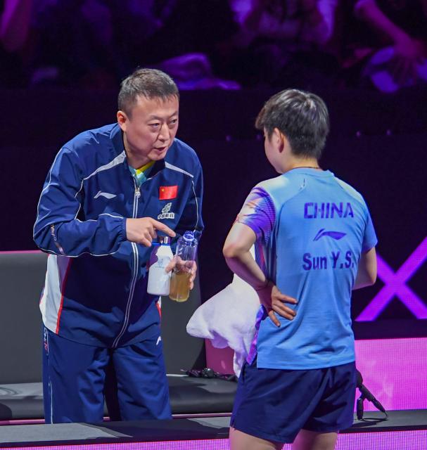 (260313) -- CHONGQING, March 13, 2026 (Xinhua) -- Coach Ma Lin (L) instructs Sun Yingsha during the women's singles round of 16 match between Sun Yingsha of China and Adriana Diaz of Puerto Rico at the WTT Champions Chongqing 2026 in southwest China's Chongqing, March 13, 2026. (Xinhua/Tang Yi)