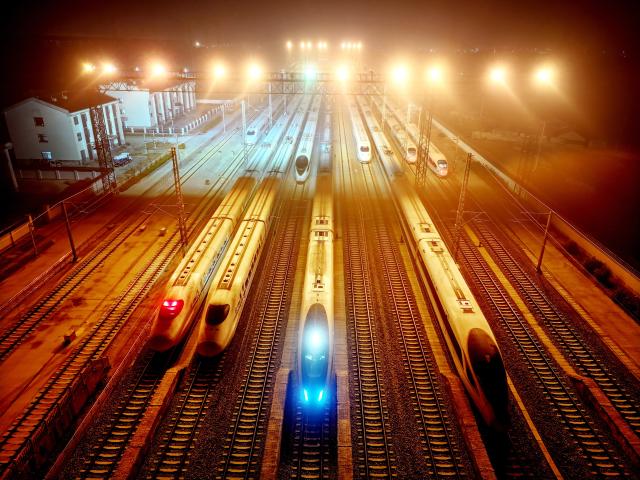 (260313) -- BEIJING, March 13, 2026 (Xinhua) -- A drone photo taken on March 13, 2026 shows bullet trains waiting for departure at Lianyungang Railway Station in Lianyungang, east China's Jiangsu Province. The 2026 Spring Festival travel rush comes to an end on Friday. (Photo by Wang Chun/Xinhua)