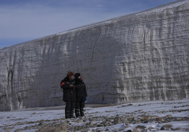 (260313) -- HAIBEI, March 13, 2026 (Xinhua) -- Rangers patrol near the Bayi Glacier in Qilian County of Haibei Tibetan Autonomous Prefecture, northwest China's Qinghai Province, March 12, 2026. (Xinhua/Du Xiaowei)