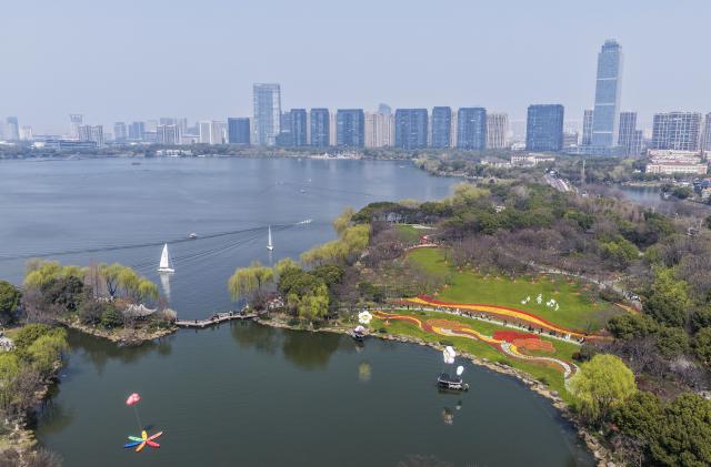 (260313) -- SHAOXING, March 13, 2026 (Xinhua) -- An aerial drone photo taken on March 13, 2026 shows a view of Guazhu lake in Shaoxing, east China's Zhejiang Province. (Xinhua/Xu Yu)