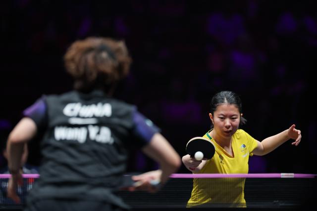 (260313) -- CHONGQING, March 13, 2026 (Xinhua) -- Liu Yangzi of Australia hits a return during the women's singles round of 16 match against Wang Yidi of China at the WTT Champions Chongqing 2026 in southwest China's Chongqing, March 13, 2026. (Xinhua/Huang Wei)