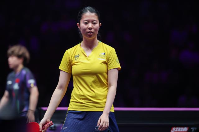 (260313) -- CHONGQING, March 13, 2026 (Xinhua) -- Liu Yangzi of Australia reacts during the women's singles round of 16 match against Wang Yidi of China at the WTT Champions Chongqing 2026 in southwest China's Chongqing, March 13, 2026. (Xinhua/Huang Wei)