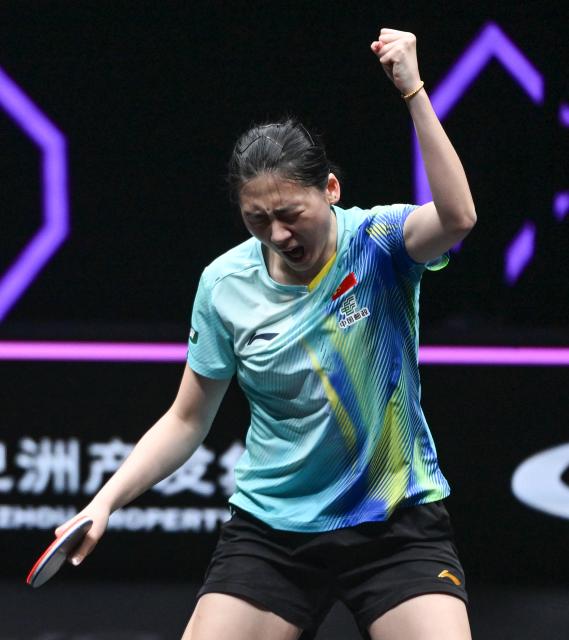(260313) -- CHONGQING, March 13, 2026 (Xinhua) -- Chen Yi of China celebrates after winning the women's singles round of 16 match against Bernadette Szocs of Romania at the WTT Champions Chongqing 2026 in southwest China's Chongqing, March 13, 2026. (Xinhua/Chen Cheng)