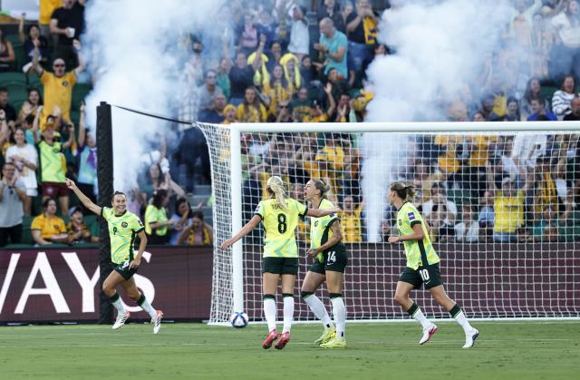 (260313) -- PERTH, March 13, 2026 (Xinhua) -- Alanna Kennedy (2nd R) of Australia celebrate scoring during the quarterfinal of Women's Asian Cup between Australia and the Democratic People's Republic of Korea (DPRK) at Perth Rectangular Stadium in Perth, Australia, March 13, 2026. (Xinhua/Ma Ping)