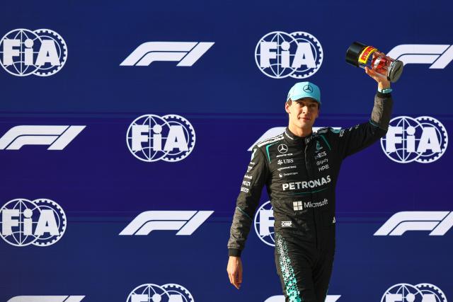 (260313) -- SHANGHAI, March 13, 2026 (Xinhua) -- Mercedes' George Russell of Britain celebrates after the Sprint Qualifying of Formula One Chinese Grand Prix at Shanghai International Circuit in Shanghai, China, March 13, 2026. (Photo by Qian Jun/Xinhua)