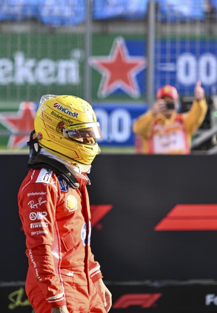 (260313) -- SHANGHAI, March 13, 2026 (Xinhua) -- Ferrari's Lewis Hamilton of Britain reacts after the Sprint Qualifying of Formula One Chinese Grand Prix at Shanghai International Circuit in Shanghai, China, March 13, 2026. (Xinhua/Chen Haoming)