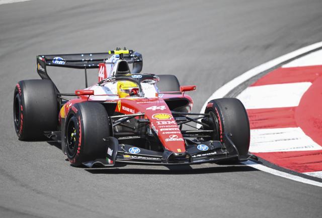 (260313) -- SHANGHAI, March 13, 2026 (Xinhua) -- Ferrari's Lewis Hamilton of Britain competes during the Sprint Qualifying of Formula One Chinese Grand Prix at Shanghai International Circuit in Shanghai, China, March 13, 2026. (Xinhua/Chen Haoming)