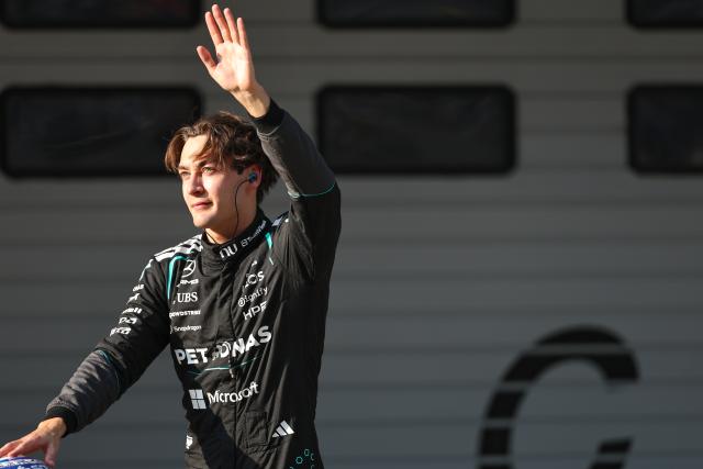 (260313) -- SHANGHAI, March 13, 2026 (Xinhua) -- Mercedes' George Russell of Britain waves after the Sprint Qualifying of Formula One Chinese Grand Prix at Shanghai International Circuit in Shanghai, China, March 13, 2026. (Photo by Qian Jun/Xinhua)