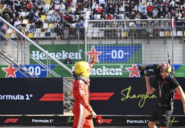 (260313) -- SHANGHAI, March 13, 2026 (Xinhua) -- Ferrari's Lewis Hamilton of Britain reacts after the Sprint Qualifying of Formula One Chinese Grand Prix at Shanghai International Circuit in Shanghai, China, March 13, 2026. (Xinhua/Chen Haoming)