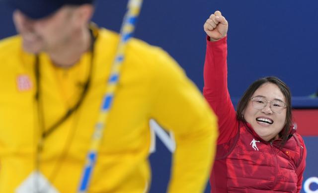 (260313) -- CORTINA D'AMPEZZO, March 13, 2026 (Xinhua) -- Li Nana of China celebrates after the wheelchair curling mixed team semifinal match between China and Sweden at the Milan-Cortina 2026 Paralympic Winter Games in Cortina D'ampezzo, Italy, March 13, 2026. (Xinhua/Wang Kaiyan)