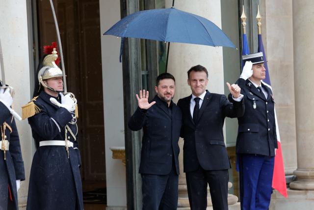 (260313) -- PARIS, March 13, 2026 (Xinhua) -- French President Emmanuel Macron (2nd R) greets Ukrainian President Volodymyr Zelensky (3rd R) at the Elysee Palace in Paris, France, March 13, 2026. (Photo by Henri Szwarc/Xinhua)