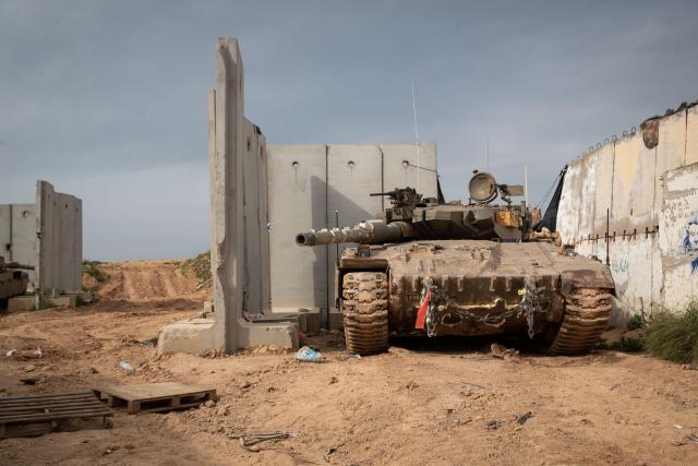 (260313) -- JERUSALEM, March 13, 2026 (Xinhua) -- Israeli troops stage at a staging area in northern Israel near the border with Lebanon, March 13, 2026. The Israeli army said Friday in a statement that it has begun a broad reinforcement of troops along the northern border with Lebanon to strengthen "readiness for various offensive and defensive scenarios," amid ongoing fighting with Hezbollah. (Xinhua/Chen Junqing)