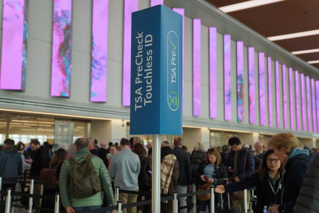 (260313) -- NEW YORK, March 13, 2026 (Xinhua) -- People line up to go through security at LaGuardia Airport in New York, the United States, on March 13, 2026. Major U.S. airports are seeing long lines at security checkpoints amid an ongoing partial government shutdown that has dragged on for nearly a month. (Xinhua/Zhang Fengguo)