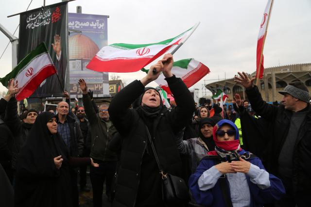 (260313) -- TEHRAN, March 13, 2026 (Xinhua) -- People attend a mass rally to mark International Quds Day in Tehran, capital of Iran, March 13, 2026. People across Iran on Friday took to the streets to mark International Quds Day, an annual event expressing support for Palestinians and condemnation of Israeli actions.
   In the capital, people marched from 10 different locations towards the iconic Enghelab Square in central Tehran, while waving Iran's flags and holding pictures of Iran's late Supreme Leader Ali Khamenei and his successor, Mojtaba Khamenei. (Xinhua)